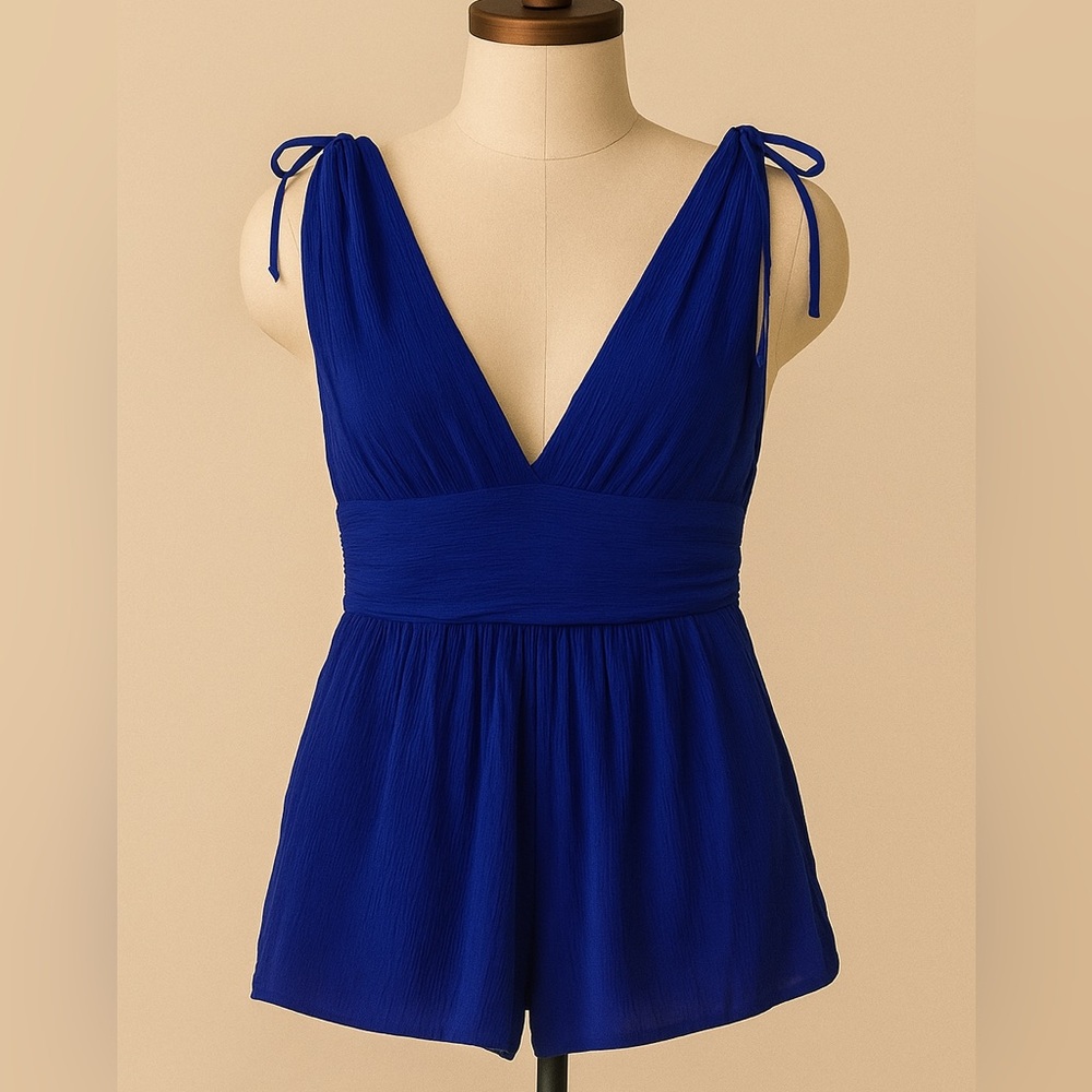 Elegant Blue Sleeveless Romper with Pockets